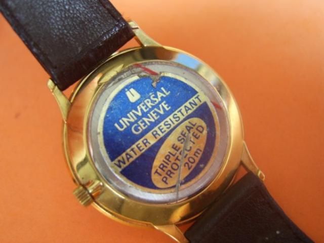 NOS 80S UNIVERSAL GENEVE QUARTZ + ORIG BAND & BUCKLE  