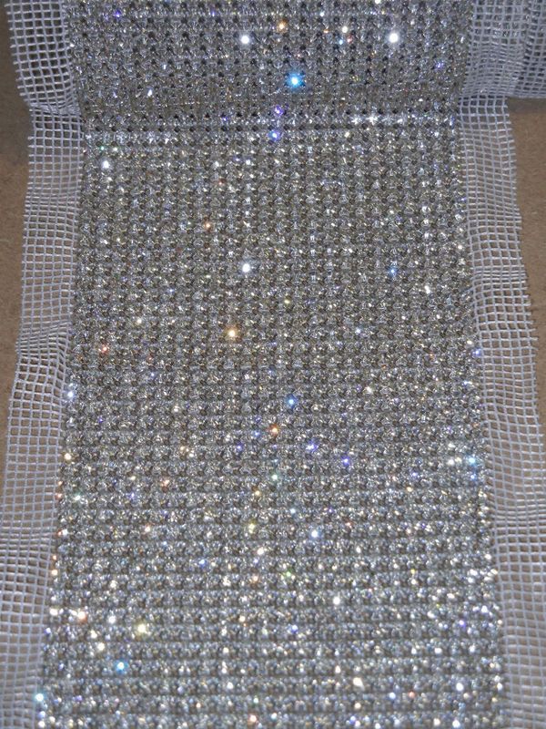 This listing is for a yard (36 inches) of 4 rows of swarovski crystal 