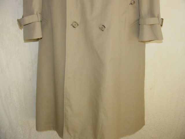 Up for grabs is a mens Trench coat by CHRISTIAN DIOR.