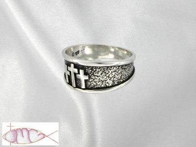 Angled left side view of the THREE CROSSES RING in Sterling Silver.