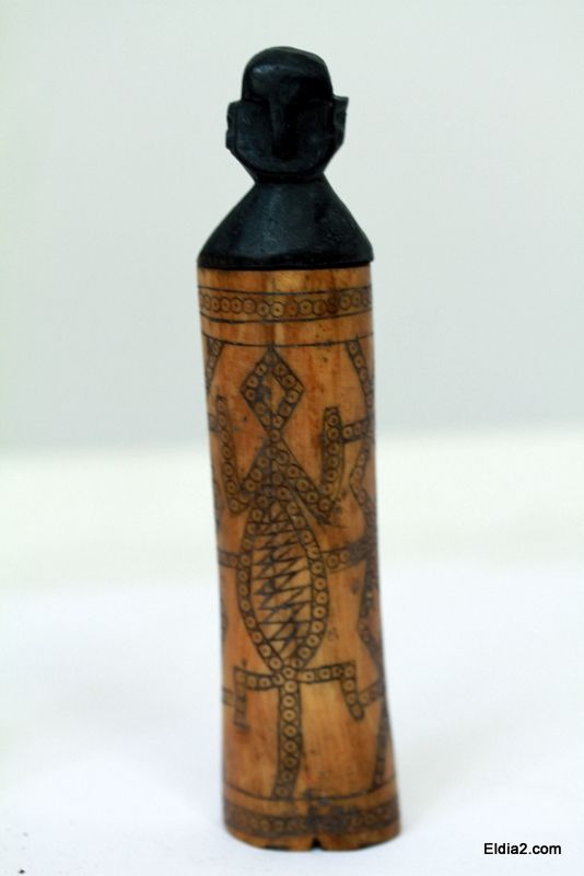 Scrimshaw with alligator ox bone figural items  