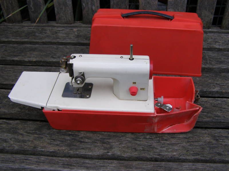 VINTAGE ORANGE BANDAI TIN METAL JAPAN SEWING MACHINE  